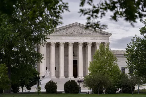 The U.S. Supreme Court is seen on Capitol Hill in Washington, May 2, 2023. The Supreme Court has rejected a challenge to a California animal cruelty law that affects the pork industry, ruling that the case was properly dismissed by lower courts. Pork producers had said that the law could force industry-wide changes and raise the cost of bacon and other pork products nationwide. (AP Photo/J. Scott Applewhite, File Photo)