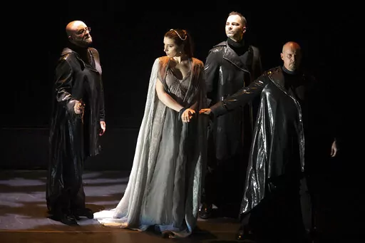 In this Dec. 29, 2021, photo provided by the Fondazione Teatro Comunale di Ferrara, singers perform in Antonio Vivaldi's "Il Farnace" in Ferrara, Italy. The Catholic Church and the city of Ferrara are making their peace with Vivaldi nearly 300 years after the city's archbishop canceled the staging of one of his operas, sending the famed Baroque composer into debt for his final years in exile. The decision was hailed by the theater's artistic director Marcello Corvino as a "marvelous gesture" tha