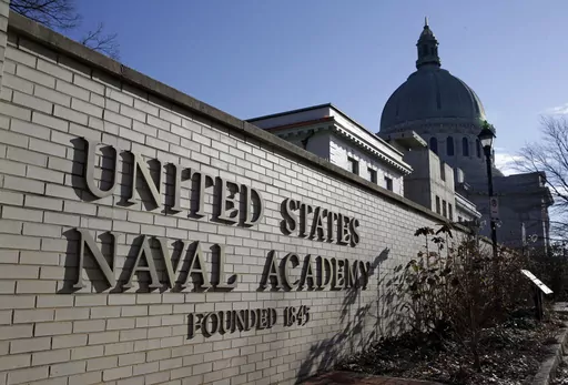 An entrance to the U.S. Naval Academy campus in Annapolis, Md., is seen Jan. 9, 2014. Reported sexual assaults at the U.S. military academies shot up during the 2021-22 school year, and one in five female students surveyed said they experienced unwanted sexual contact, the Associated Press has learned. (AP Photo/Patrick Semansky, File)