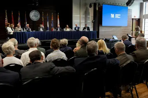 Members of the Tennessee Valley Authority Board of Directors listen to members of the public during a meeting, May 8, 2024, in Nashville, Tenn. (AP Photo/George Walker IV, File)