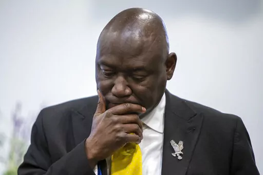 Civil rights attorney Ben Crump takes part in a press conference at the Renaissance Church of God in Christ Family Life Center in Grand Rapids, Mich. on Thursday, April 14, 2022. Crump is representing the family of Patrick Lyoya, who was shot and killed by a Grand Rapids Police Department officer on April 4. (Cory Morse/The Grand Rapids Press via AP)