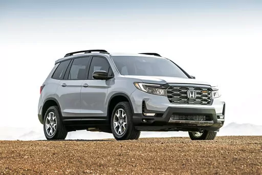 This photo provided by Honda shows the 2022 Honda Passport, a midsize two-row SUV that received bolder styling for the 2022 model year. (Courtesy of American Honda Motor Co. via AP)