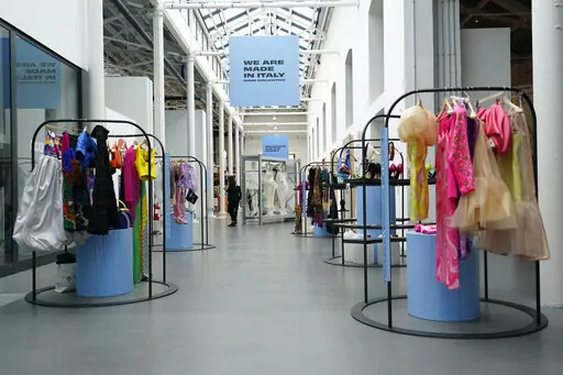 Creations, part of the 'We Are Made in Italy' collecting fashion event are shown during the women's Spring Summer 2023 fashion week, in Milan, Italy, Wednesday, Sept. 21, 2022. Milan Fashion Week opening Wednesday celebrates perhaps its most diverse season ever, abuzz with new creative directors of color at such storied houses as Salvatore Ferragamo and Bally and marking the return of Haitian-Italian designer Stella Jean after a two-year haitus. But Jean and other industry insiders behind a two-