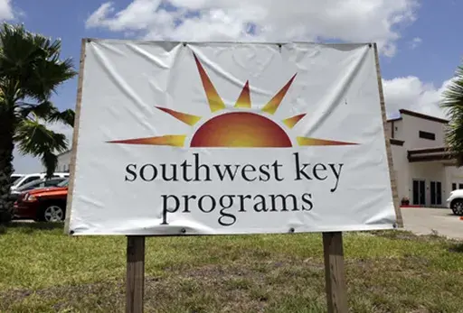 A Southwest Key Programs sign is displayed on June 20, 2014, in Brownsville, Texas. Southwest Key, the largest housing provider for unaccompanied migrant children has been accused of “severe, pervasive, and unwelcome sexual abuse of and harassment” of children in its care, the Justice Department said Thursday, July 18, 2024. (AP Photo/Eric Gay, File)