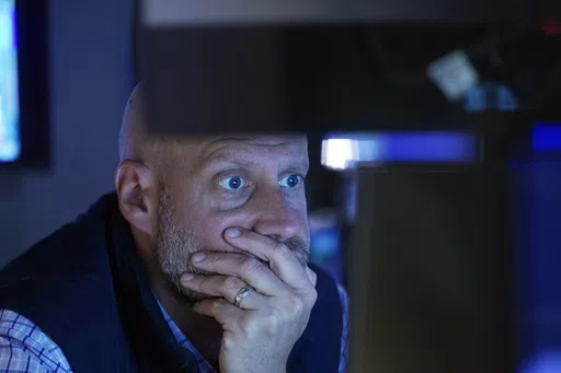 Specialist Meric Greenbaum works at his post on the floor of the New York Stock Exchange, Thursday, May 30, 2024. Most U.S. stocks are rising following mixed profit reports from big companies and signals that the economy may be cooling. (AP Photo/Richard Drew)
