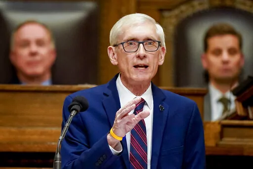 Wisconsin Gov. Tony Evers addresses a joint session of the Legislature in the Assembly chambers at the state Capitol in Madison, Wis. on Feb. 15, 2022. Wisconsin Democrats gathering for their annual state convention this weekend are focused on reelecting Gov. Evers and defeating Republican Sen. Ron Johnson, but also know that history is against them in the midterm year as voters face high inflation, rising gas prices and growing concerns about a recession. Evers and Democratic candidates seeking