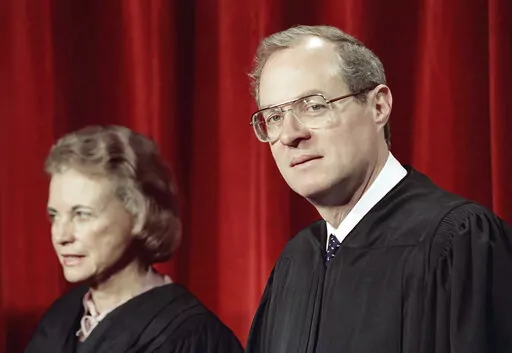 Justice Anthony Kennedy, the newest member of the Supreme Court, and Justice Sandra Day O'Connor, are shown on April 15, 1988, in Washington, at the Supreme Court during a picture taking session. The full court was also present for the photo session. For years, the Supreme Court moved to the left or right only as far as Justices O'Connor and Kennedy allowed. They held pivotal votes on a court closely divided between liberals and conservatives. Now, though, a more conservative court that includes