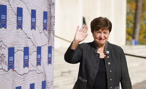 International Monetary Fund President Kristalina Georgieva waves as she arrives for a meeting of G20 finance and health ministers at the Salone delle Fontane (Hall of Fountains) in Rome, Oct. 29, 2021. (AP Photo/Alessandra Tarantino, File)