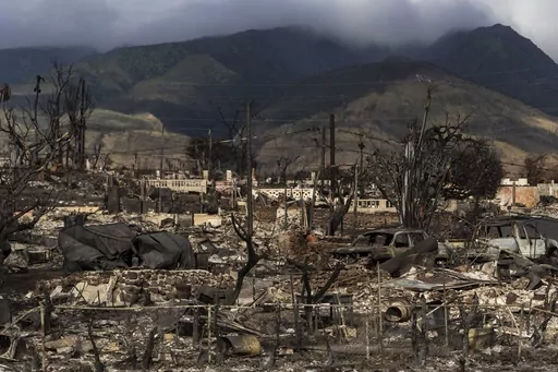 A general view shows the aftermath of a wildfire in Lahaina, Hawaii, Aug. 21, 2023. Hawaii’s electric utility acknowledged its power lines started a wildfire on Maui but faulted county firefighters for declaring the blaze contained and leaving the scene, only to have a second wildfire break out nearby and become the deadliest in the U.S. in more than a century. (AP Photo/Jae C. Hong, File)