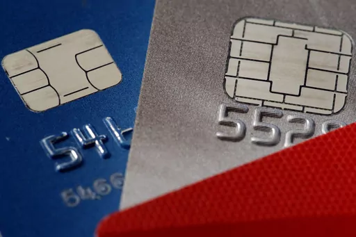 Credit cards are seen in Philadelphia on June 10, 2015. When a credit card issuer decides to close an account, there may be a narrow window of time in which you can help safeguard your credit scores. (AP Photo/Matt Rourke, File)