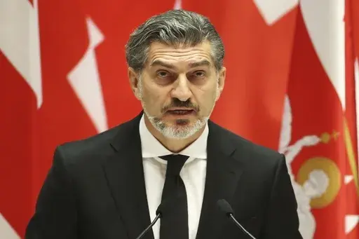 Georgian President-elect Mikheil Kavelashvili speaks at his swearing-in ceremony at the Georgian Parliament in Tbilisi, Georgia, Sunday, Dec. 29, 2024. (Irakli Gedenidze/Pool Photo via AP)