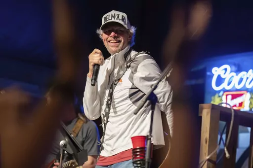 Toby Keith performs at his Hollywood Corners restaurant and music venue in Norman, Okla., on June 30, 2023. Keith was back on stage over the Fourth of July weekend with his first shows since revealing last summer that he had been fighting stomach cancer. (Suzanne Cordeiro via AP)
