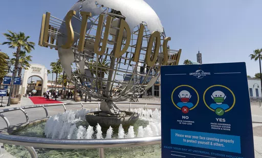 The Universal Studios Hollywood officially reopens to the public at 25% capacity with COVID-19 protocols in place in Los Angeles, on April 16, 2021. A tram accident at Universal Studios in Los Angeles injured multiple people Saturday night, April 20, 2024, authorities and the company said. (AP Photo/Damian Dovarganes, File)