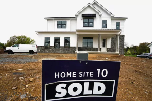 A home under construction marked as "SOLD" at a development in Eagleville, Pa., is shown on Friday, April 28, 2023. The United States is slogging through a housing affordability crisis that was decades in the making. The shortage pours cold water on President Joe Biden's assurances that the U.S. economy is strong and underscores the degree to which Republican presidential candidate, former President Donald Trump, has largely overlooked the issue. (AP Photo/Matt Rourke, File)