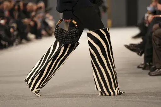 A model wears a creation as part of the Balmain Fall/Winter 2025-2026 Womenswear collection presented in Paris, Wednesday, March 5, 2025. (Photo by Scott A Garfitt/Invision/AP)
