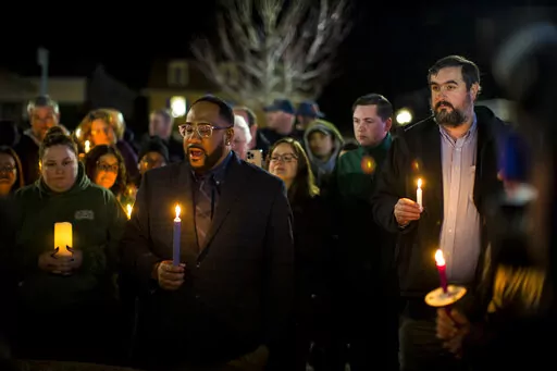 Newport News Councilman Elect John Eley, South District 3, speaks at a candlelight vigil in honor of Richneck Elementary School first-grade teacher Abby Zwerner at the School Administration Building in Newport News, Va., Monday, Jan. 9, 2023. Eley served on the Newport News School Board before being elected a councilman. Zwerner was shot and wounded by a 6-year-old student while teaching class on Friday, Jan. 6. (AP Photo/John C. Clark)