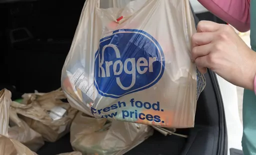 A customer removes her purchases at a Kroger grocery store in Flowood, Miss., Wednesday, June 26, 2019. The Federal Trade Commission on Monday, Feb. 16, 2024, sued to block a proposed merger between grocery giants Kroger and Albertsons, saying the $24.6 billion deal would eliminate competition and lead to higher prices for millions of Americans.(AP Photo/Rogelio V. Solis, File)