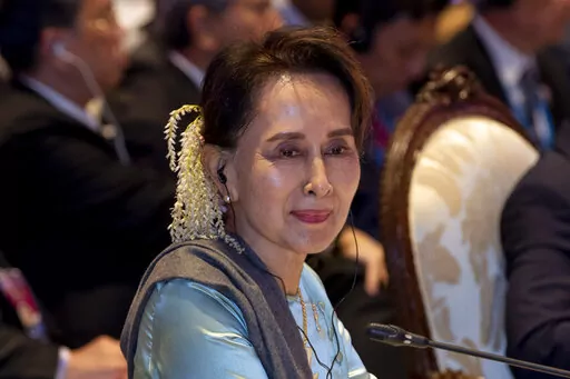 Myanmar leader Aung San Suu Kyi participates in the ASEAN-Japan summit in Nonthaburi, Thailand on Nov. 4, 2019. A legal official says ousted Myanmar leader Aung San Suu Kyi has been sentenced to 5 years in prison in the first of several corruption cases. (AP Photo/Gemunu Amarasinghe, File)