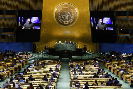 Ukrainian President Volodymyr Zelenskyy addresses the 77th session of the United Nations General Assembly, at U.N. headquarters, Wednesday, Sept. 21, 2022. (AP Photo/Jason DeCrow)