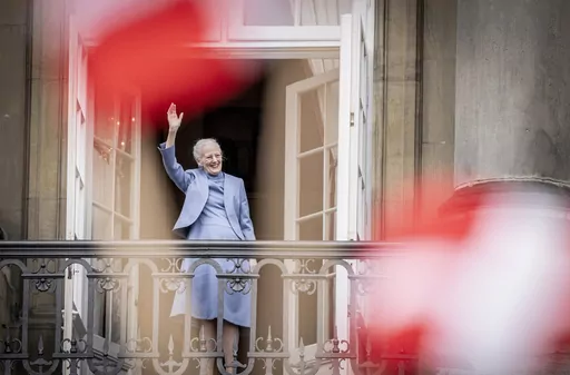 Denmark's Queen Margrethe II waves from the balcony during celebrations for her 83rd birthday, at Amalienborg Castle in Copenhagen, Sunday, April 16, 2023. Queen Margrethe II, Denmark’s monarch for more than half a century, stunned her country when she announced on New Year’s Eve that she will hand over the throne to her eldest son, Crown Prince Frederik, on Jan. 14, 2024. It’s the first time a Danish monarch has stepped down voluntarily in nearly 900 years. (Mads Claus Rasmussen/Ritzau Sc