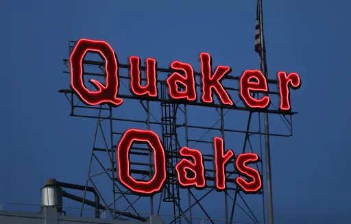 The Quaker Oats sign is seen in Cedar Rapids, Iowa on Tuesday, June 8, 2021. The Quaker Oats Company has expanded a December recall of more than 40 products that may be contaminated with salmonella to include two dozen additional types of granola bars, cereals and snack foods, Friday, Jan. 12, 2023. (Rebecca F. Miller/The Gazette via AP, File)