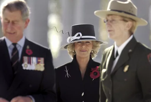Camilla, Duchess of Cornwall, center, Britain's Prince Charles, left, and Vikki Keys, Superintendent of the National Mall and Memorial Parks visit the World War II Memorial in Washington, Friday, Nov. 4, 2005. Britain's queen consort, Camilla, has come a long way. On May 6, she will be crowned alongside her husband and officially take her first turns on the world stage as Queen Camilla. (Jason Reed, Pool Photo via, File)