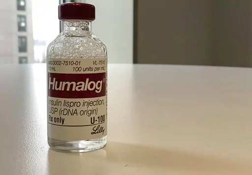 This Wednesday, March 1, 2023 photo shows a vial of Eli Lilly's Humalog insulin in New York. Eli Lilly will cut prices for some older insulins later this year and immediately give more patients access to a cap on costs they pay to fill prescriptions. The moves announced March 1, 2023 promise critical relief to some people with diabetes who can face annual costs of more than $1,000 for insulin they need in order to live. Lilly’s changes also come as lawmakers and patient advocates pressure drug