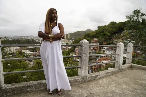 Benny Briolly, a transgender woman running for city council, poses for a photo during a campaign event with supporters and members of her campaign team in Morro do Estado, in Niteroi, Rio de Janeiro state, Brazil, Saturday, Sept. 28, 2024. (AP Photo/Hannah-Kathryn Valles)