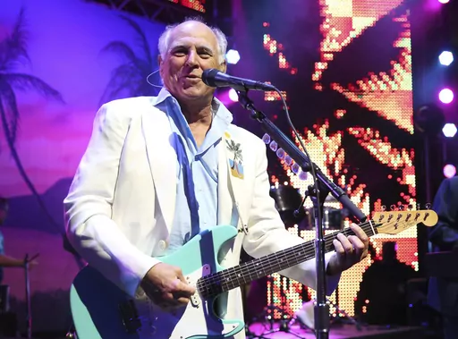 Jimmy Buffett performs at the after party for the premiere of "Jurassic World" in Los Angeles, on June 9, 2015. “Margaritaville” singer-songwriter Jimmy Buffett has died at age 76. A statement on Buffett's official website and social media pages says the singer died Friday, Sept. 1, 2023 “surrounded by his family, friends, music and dogs”. (Photo by Matt Sayles/Invision/AP, File)