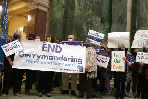 More than 100 opponents of the Republican redistricting plans vow to fight the maps at a rally ahead of a joint legislative committee hearing at the Wisconsin state Capitol in Madison, Wis., on Thursday, Oct. 28, 2021. In overturning a half-century of nationwide legal protection for abortion, the U.S. Supreme Court ruled that Roe v. Wade had been wrongly decided and that it was time to “return the issue of abortion to the people's elected representatives” in the states. But some question whe