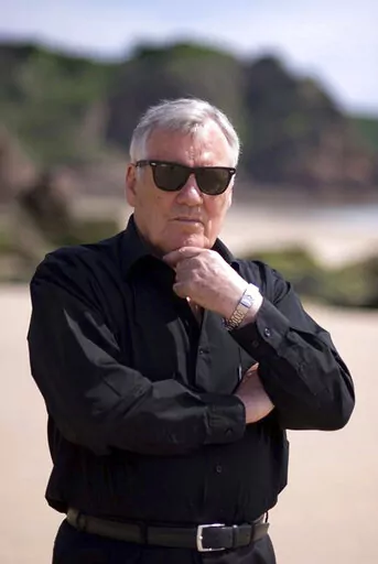 Undated handout photo issued by HarperCollins Publishers of best-selling novelist Henry Patterson, who wrote 85 books, including The Eagle Has Landed, using the pseudonym Jack Higgins, has died aged 92. (HarperCollins Publisher/PA via AP)