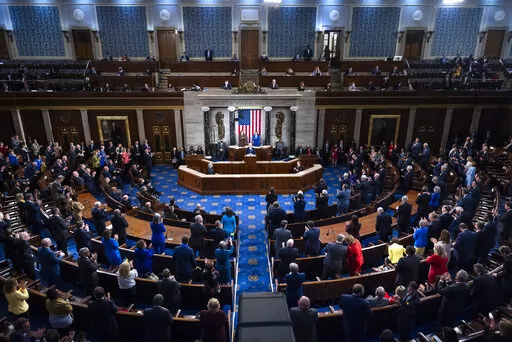 President Joe Biden delivers his first State of the Union address to a joint session of Congress at the Capitol, Tuesday, March 1, 2022, in Washington.  On Friday, March 18, The Associated Press reported on stories circulating online incorrectly claiming members of Congress gave themselves a 21% pay raise in early March.(Jim Lo Scalzo/Pool via AP, File)