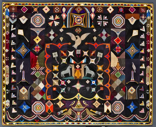 This image provided by the American Folk Art Museum shows the Original Design Quilt made by Corning, NY tailor Carl Klewicke around 1907. The piece is made of vivid bits of silk, faille, taffeta and satin depicting stars, kites and doves. The joyful piece took Mr. Klewicke 20 years to finish and was given by him and his wife to their daughter on her wedding day. (American Folk Art Museum via AP)