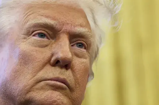 President Donald Trump speaks to reporters in the Oval Office at the White House in Washington, Wednesday, March 26, 2025. (Pool via AP)