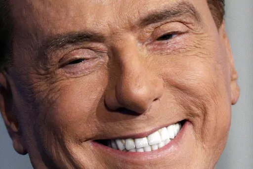 Italian former Premier and Forza Italia (Go Italy) party leader, Silvio Berlusconi, smiles during the recording of the Italian state television RAI, Porta a Porta (Door To Door) TV talk show in Rome Thursday, Jan. 11, 2018. Italy is poised to elect a new president, a figure who is supposed to serve as the nation's moral compass and foster unity by being above the political fray. Silvio Berlusconi thinks he fits the bill. (AP Photo/Andrew Medichini, File)