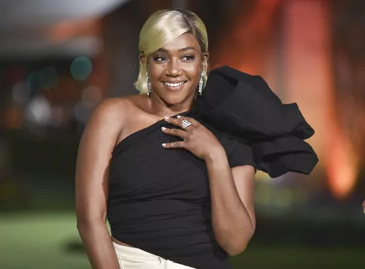 Tiffany Haddish appears at the Academy Museum of Motion Pictures Gala in Los Angeles on Sept. 25, 2021. Haddish’s next book will be in part a story of laughing through the tears. Her essay collection “I Curse You With Joy” is scheduled for Nov. 29. (Photo by Richard Shotwell/Invision/AP, File)