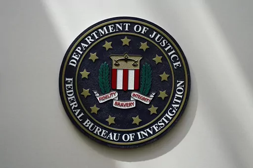 The FBI seal is pictured in Omaha, Neb., Aug. 10, 2022. A Utah man has been charged with threatening a Palestinian rights organization in Washington. The case was unsealed Monday, Nov. 20, 2023, as tensions rise in the U.S. from the devastating war between Israel and Hamas. (AP Photo/Charlie Neibergall, File)