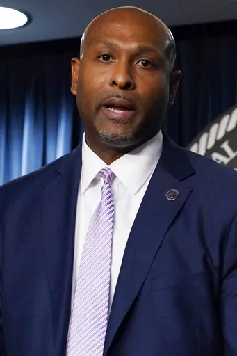 Mississippi Highway Patrol Lt. Col. Charles Haynes, speaks to reporters about becoming the new director of the Mississippi Bureau of Investigation, Wednesday, May 18, 2022, in Jackson, Miss. (AP Photo/Rogelio V. Solis)
