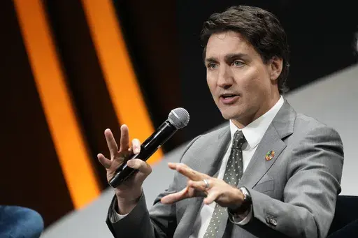 Canadian Prime Minister Justin Trudeau speaks during a panel discussion at the Global Citizen NOW Summit on April 27, 2023, in New York. Trudeau's government is expelling a Chinese diplomat whom Canada’s spy agency alleged was involved in a plot to intimidate an opposition lawmaker and his relatives in Hong Kong. (AP Photo/Mary Altaffer, File)