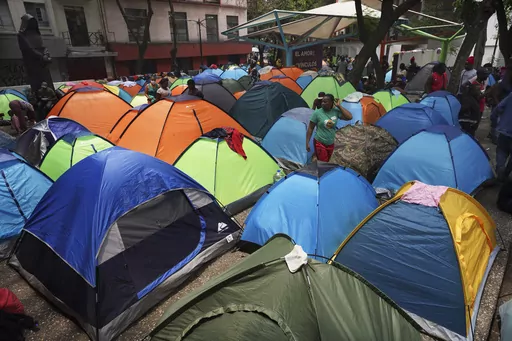 Haitian migrants camp out at the Giordano Bruno plaza in Mexico City, May 18, 2023. The group was staying at a shelter in Mexico City on their way north but were forced to make camp at the park after the shelter closed. (AP Photo/Marco Ugarte, File)