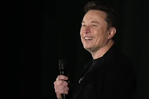 Elon Musk speaks as part of a campaign town hall in support of Republican presidential nominee former President Donald Trump in Folsom, Pa., Thursday, Oct. 17, 2024. (AP Photo/Matt Rourke, File)