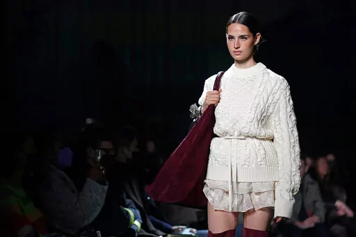 The Brandon Maxwell fall/winter 2022 collection is modeled during New York Fashion Week at the Daryl Roth Theatre on Saturday, Feb. 12, 2022, in New York. (Photo by Charles Sykes/Invision/AP)