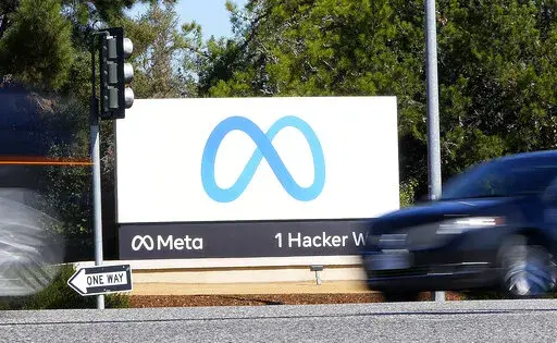 Facebook unveiled their new Meta sign at the company headquarters in Menlo Park, Calif., on Oct. 28, 2021. Facebook parent Meta's 2022 first quarter profit jumped past Wall Street's expectations despite slower revenue growth, sending shares up sharply in after-hours trading. The company earned $7.47 billion, or $2.72 per share, in the January-March period. (AP Photo/Tony Avelar, File)