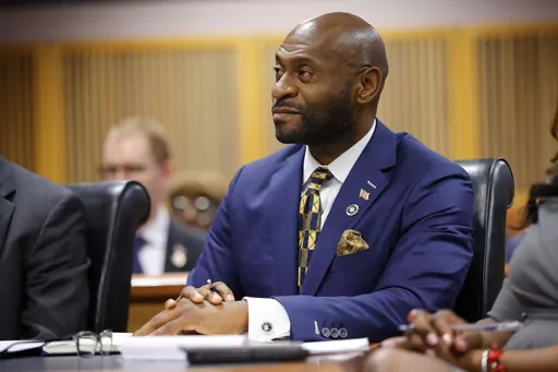 FILE- Special prosecutor Nathan Wade looks on during a hearing on the Georgia election interference case, Friday, March, 1, 2024, in Atlanta. A progressive Democrat and a Republican who briefly worked in Donald Trump's administration entered the Fulton County district attorney's race Friday, March 8, 2024, as the current officeholder, Fani Willis, awaits a judge's decision on whether she will be removed from the Georgia election interference case against the former president because of a relatio