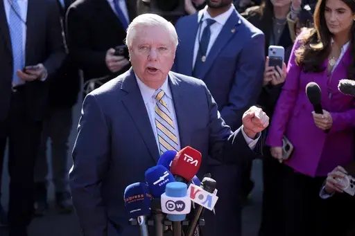 Sen. Lindsey Graham, R-S.C., speaks to reporters outside the West Wing of the White House, Friday, Feb. 28, 2025, in Washington. (AP Photo/Evan Vucci)