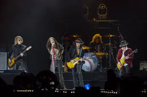 Tom Hamilton, from left, Steven Tyler, Joe Perry, John Douglas and Brad Whitford of Aerosmith, perform on Sept. 8, 2022, at Fenway Park in Boston. Aerosmith will be touring a city near you for the last time to celebrate their 50-plus years of being together. The Rock & Roll Hall of Fame band announced Monday, May 1, 2023 the dates for their farewell tour called “Peace Out” starting Sept. 2 in Philadelphia. (Photo by Winslow Townson/Invision/AP, file)