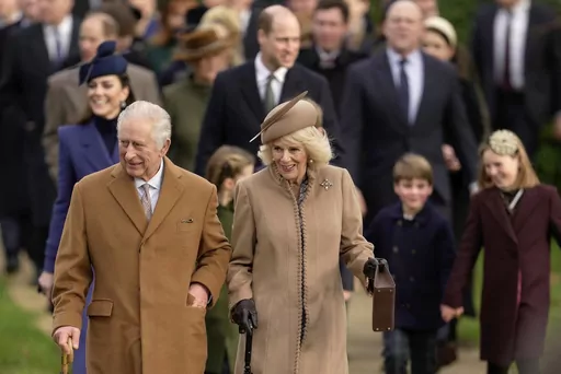 Britain's King Charles III and Queen Camilla arrive to attend the Christmas day service at St Mary Magdalene Church in Sandringham in Norfolk, England, Dec. 25, 2023. (AP Photo/Kin Cheung, File)