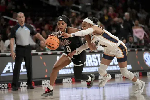 Mississippi State guard Denim DeShields (0) dribbles against California guard Kayla Williams (4) during the first half in the first round of the NCAA college basketball tournament Saturday, March 22, 2025, in Los Angeles. (AP Photo/Eric Thayer)