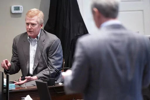 Defendant Alex Murdaugh is cross examined by prosecutor Creighton Waters while testifying in his murder trial at the Colleton County Courthouse, Feb. 24, 2023, in Walterboro, S.C. Prosecutors in the case against Murdaugh had no murder weapon or any other direct evidence linking him to the killings of his wife and son. Yet, a jury took less than three hours to convict him — thanks, in large part, to the defendant himself. (Joshua Boucher/The State via AP, Pool, File)