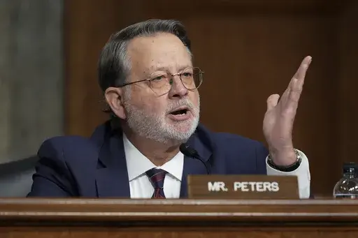 Sen. Gary Peters, D-Mich., speaks during the Senate Armed Services Committee confirmation hearing for Pete Hegseth, President-elect Donald Trump's choice to be Defense secretary, at the Capitol in Washington, Jan. 14, 2025. (AP Photo/Ben Curtis, File)